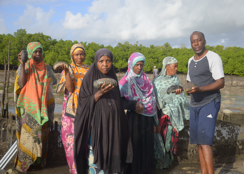 Daud Salum with Shehia Fishers Committee members, Pemba