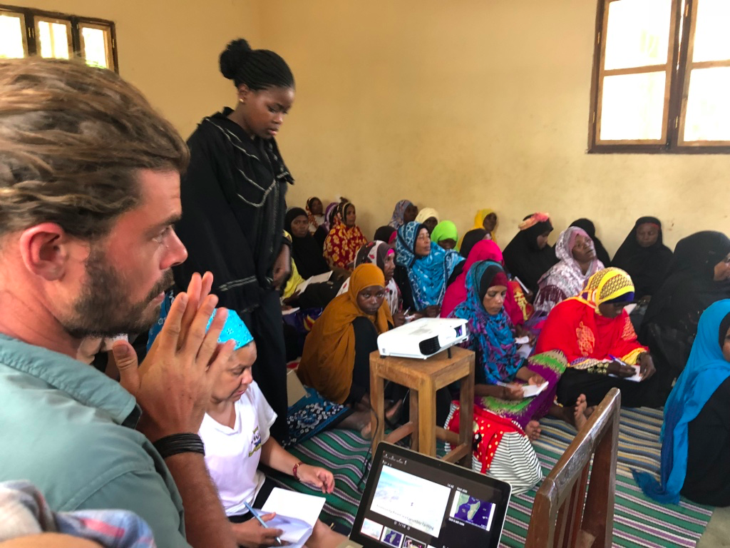 Timothy Klückow running a community training session on Pemba Island